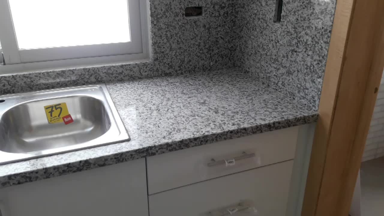 Obra entregada por Grupo Argamax — Revestimiento book-matched