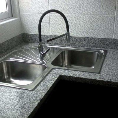 Obra entregada por Grupo Argamax — Isla de cocina en granito